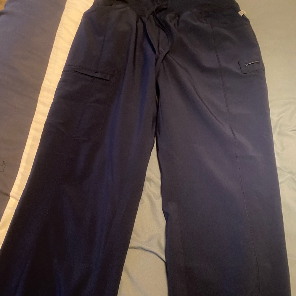 Two pairs of infinity scrub pants